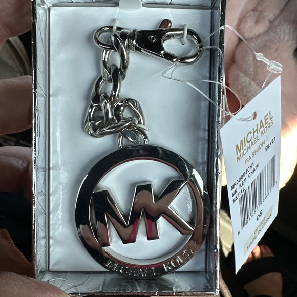 MICHAEL Michael Kors Accessories - MK Michael Kors ❤️Authentic silver metal Purse Charm
New w/Tag in MK Gift Box